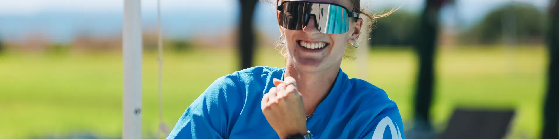 Girl in sunglasses smiling